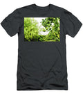 1 Green Lemons Hanging From the Lemon Tree on a Rainy Day Joaquin Corbalan T-Shirt