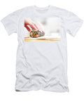 1 Preparing Rolling Sushi Salmon Avocado Rice and Chopsticks on Wooden Table Michal Bednarek T-Shirt