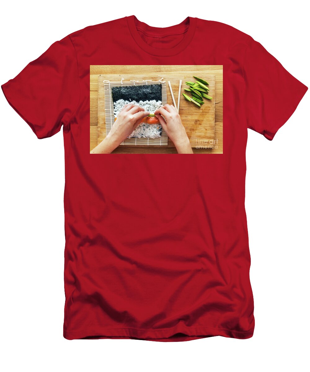 1 Preparing Sushi Salmon Avocado Rice and Chopsticks on Wooden Table Michal Bednarek T-Shirt