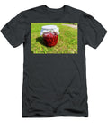 2 Delicious Fresh Ripe Raspberries in Glass Jar on a Grass Backgro Jacek Dudzinski T-Shirt