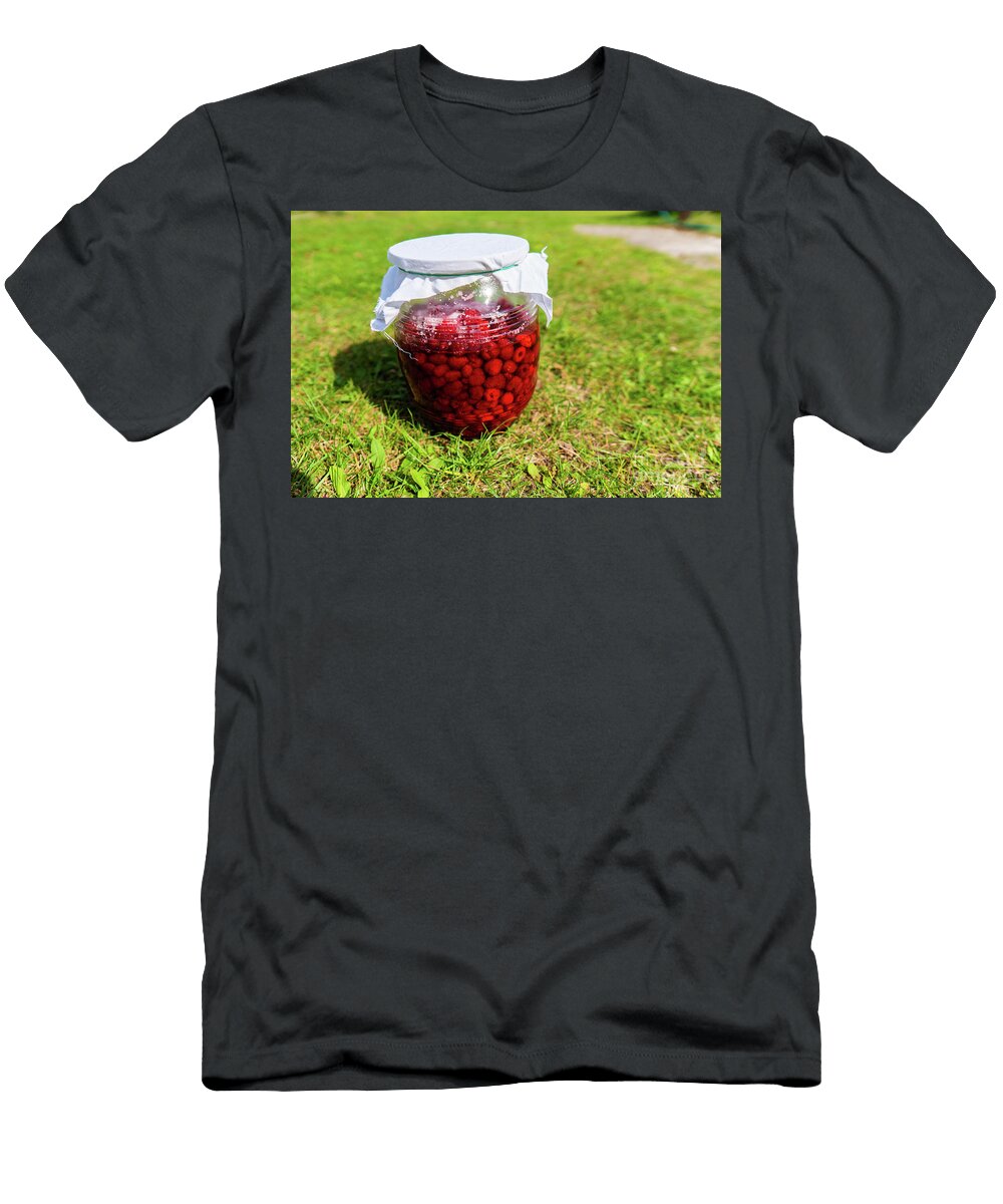 2 Delicious Fresh Ripe Raspberries in Glass Jar on a Grass Backgro Jacek Dudzinski T-Shirt
