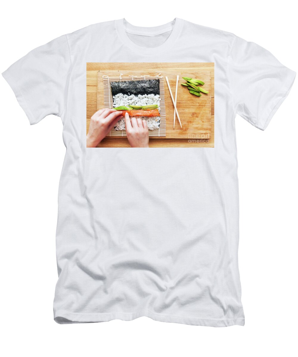2 Preparing Sushi Salmon Avocado Rice and Chopsticks on Wooden Table Michal Bednarek T-Shirt