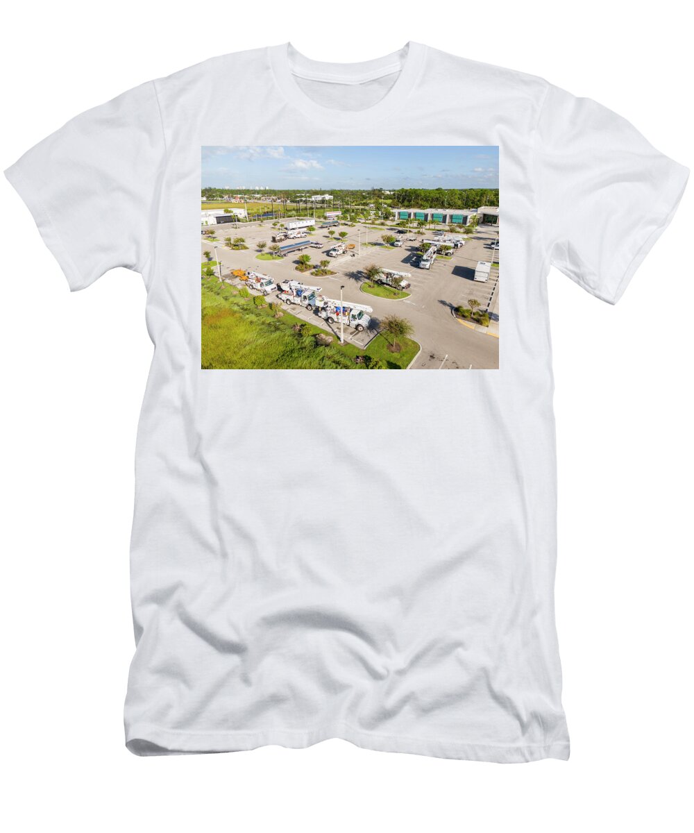 3 Hurricane Damage Restoration Electritions with Bucket Trucks on Felix Mizioznikov T-Shirt