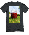 4 Delicious Fresh Ripe Raspberries in Glass Jar on a Grass Backgro Jacek Dudzinski T-Shirt