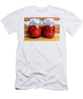 7 Fresh Raspberry in a Glass Jar on Grass Next to Fresh Raspberri Jacek Dudzinski T-Shirt