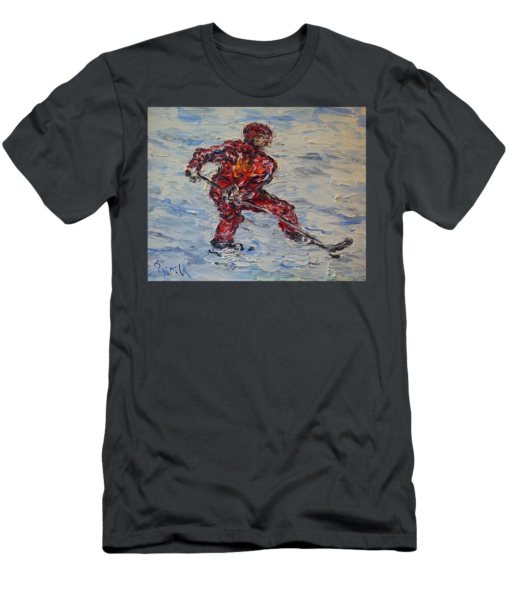 A Hockey Player in a Red Uniform with a Stick and a Puck Plays Hockey on the Ice Field Kirill Sukhanov T-Shirt