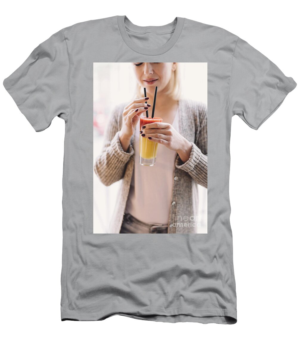 Blonde Woman Holding a Colorful Drink Michal Bednarek T-Shirt