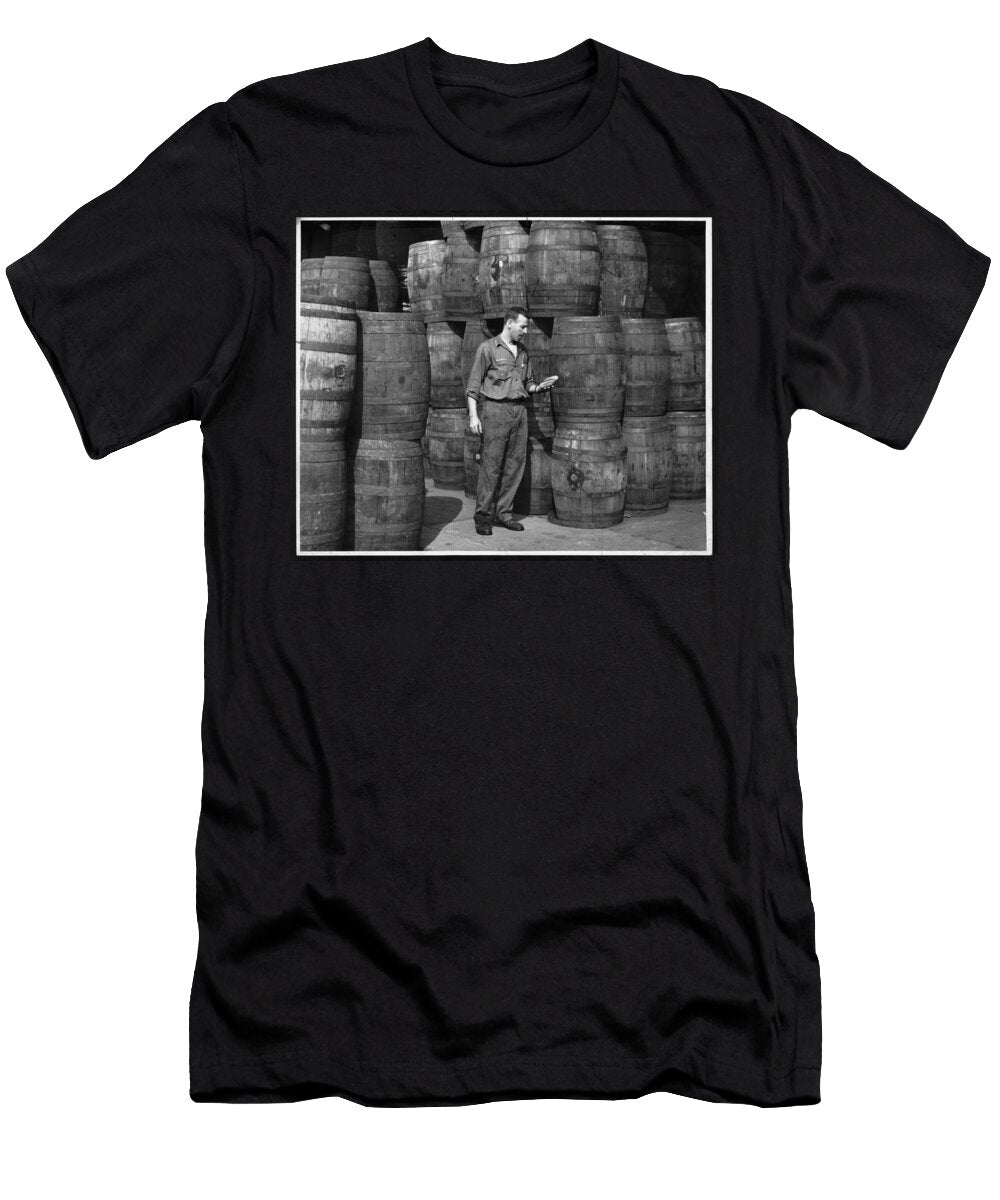 Co Owner of Washington Pickle Works Holding Two Pickles in a Room Full of Barrels of Dill Pickles P Artistic Rifki T-Shirt