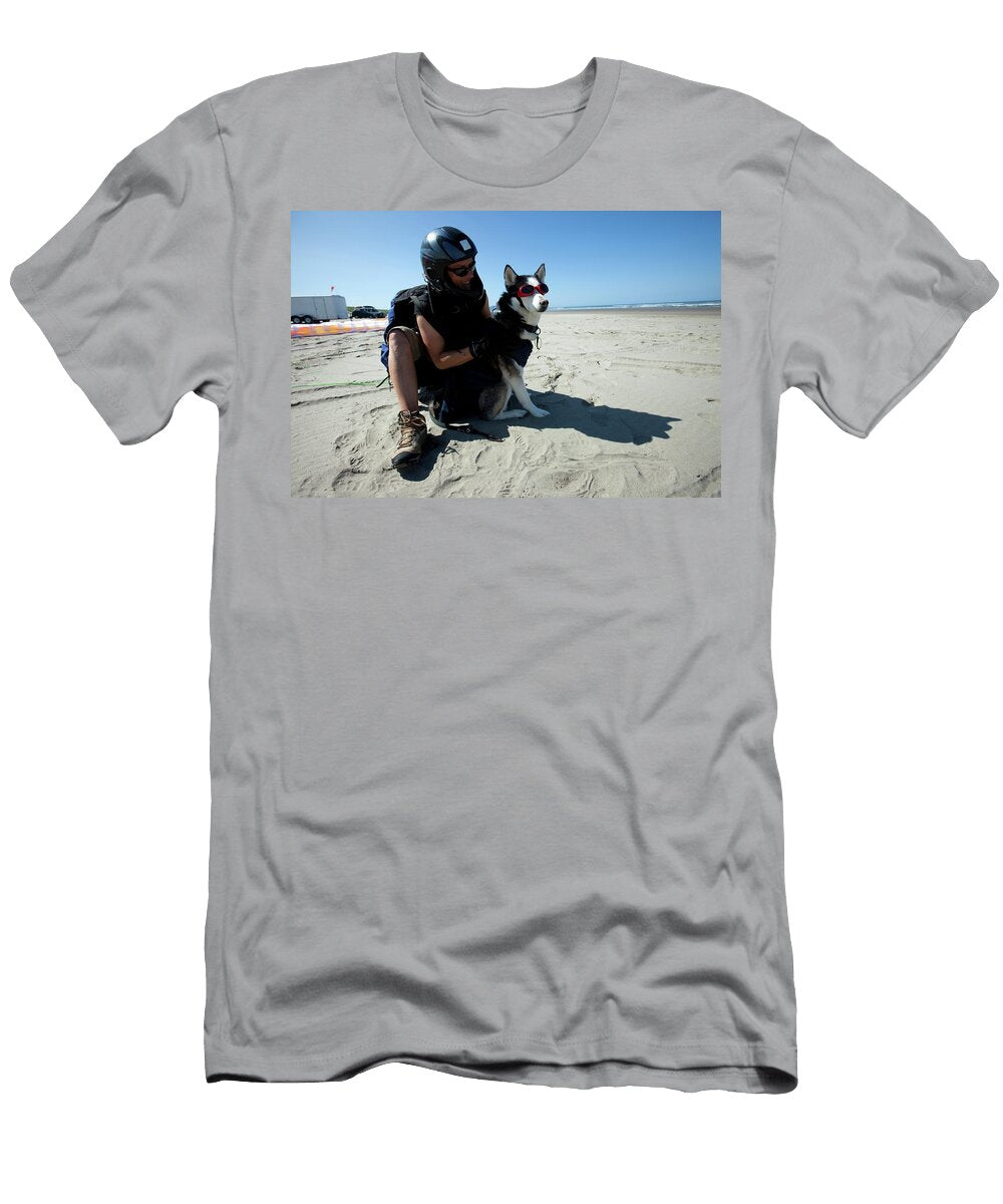 Female Paraglider Holding and Petting Trevor Clark T-Shirt