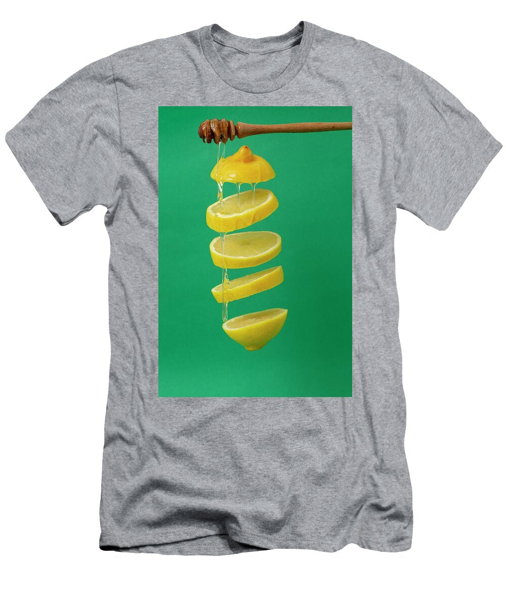 Lemon Slices Levitating on a Green Background with Honey Dorin Puha T-Shirt