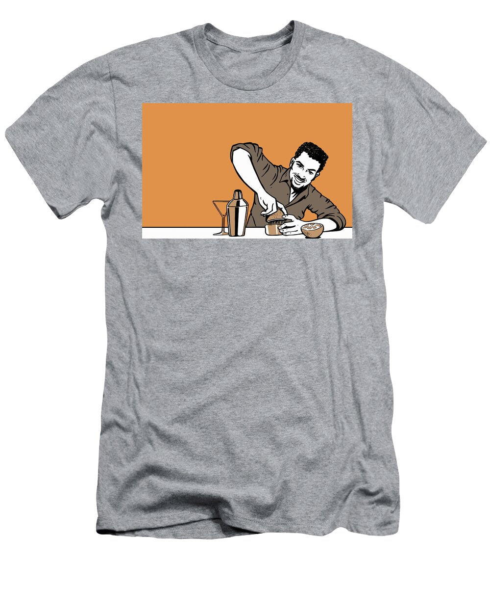 Man Squeezing Lemon for Cocktail Ikon Images T-Shirt
