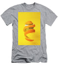 Orange Peel Around a Disco Mirror Ball Floating on Yellow Backg Dorin Puha T-Shirt
