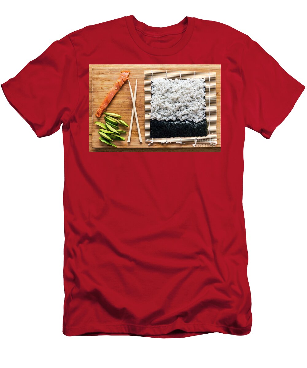 Preparing Sushi Salmon Avocado Rice and Chopsticks on Wooden Table Michal Bednarek T-Shirt