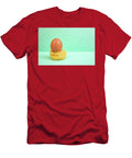 Raw Whole Egg on a Rolled Pasta Nest on Bright Green Background Dorin Puha T-Shirt