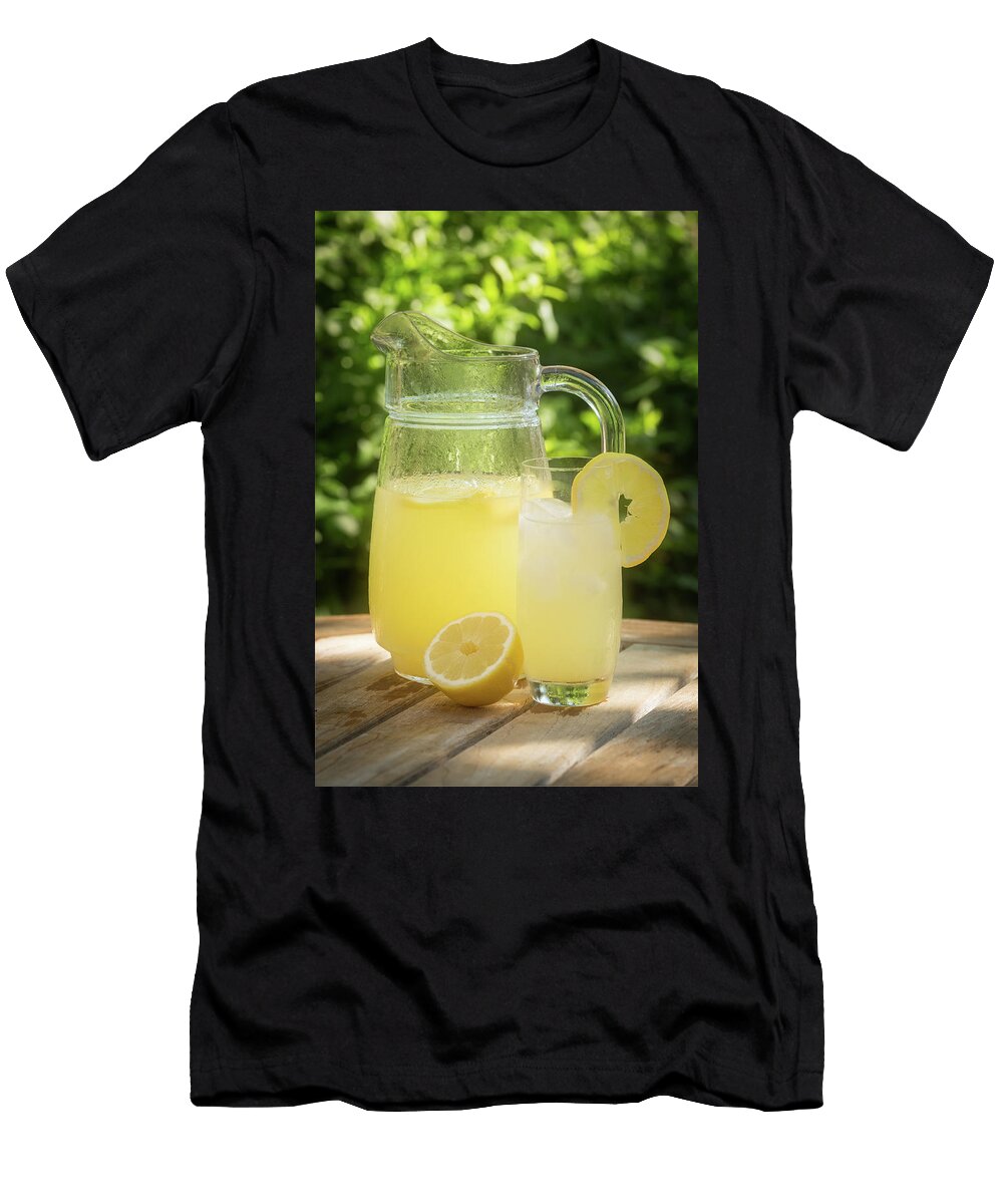 Sunlit Jug and Glass of Fresh Corsican Lemonade in Garden Jon Ingall T-Shirt