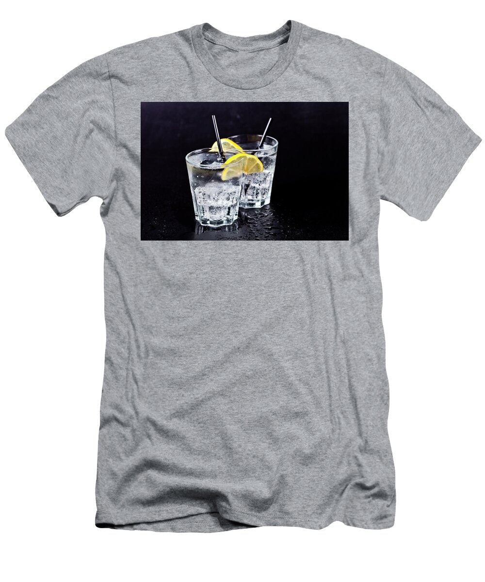Two Glasses of Fresh Cold Carbonated Water with Ice Cubes and Le Liss Art Studio T-Shirt