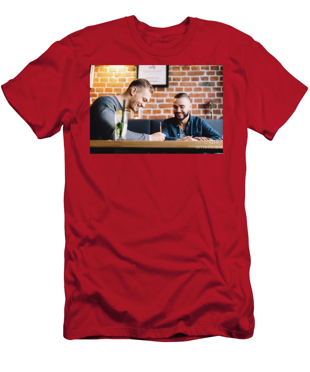 Two Men Sitting in a Restaurant and Laughing Michal Bednarek T-Shirt
