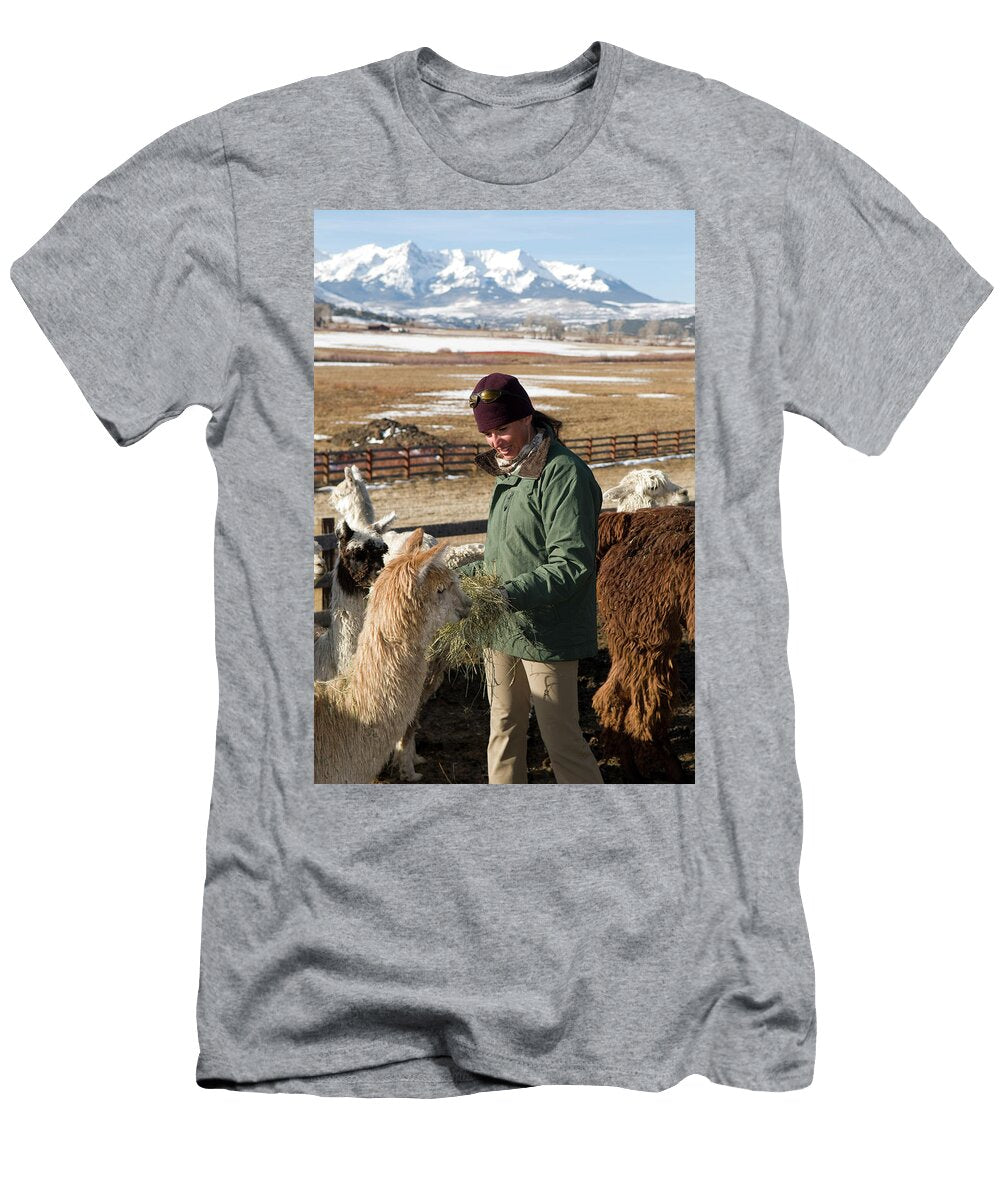 Woman Feeding Alpacas Ridgeway Kennan Harvey T-Shirt