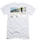 Woman Snow Shoeing with a Husky Jayms Ramirez T-Shirt