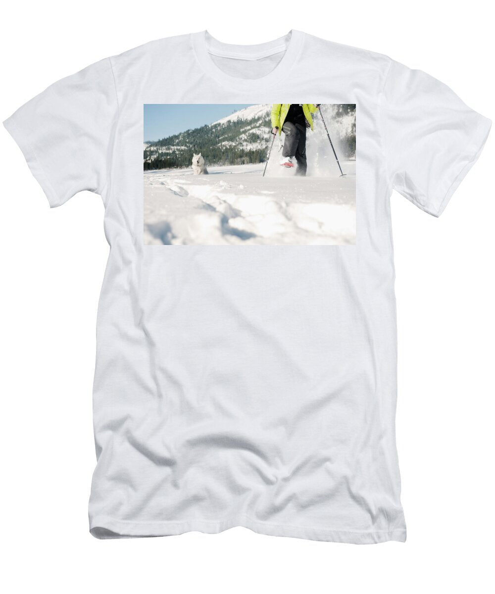 Woman Snow Shoeing with a Husky Jayms Ramirez T-Shirt
